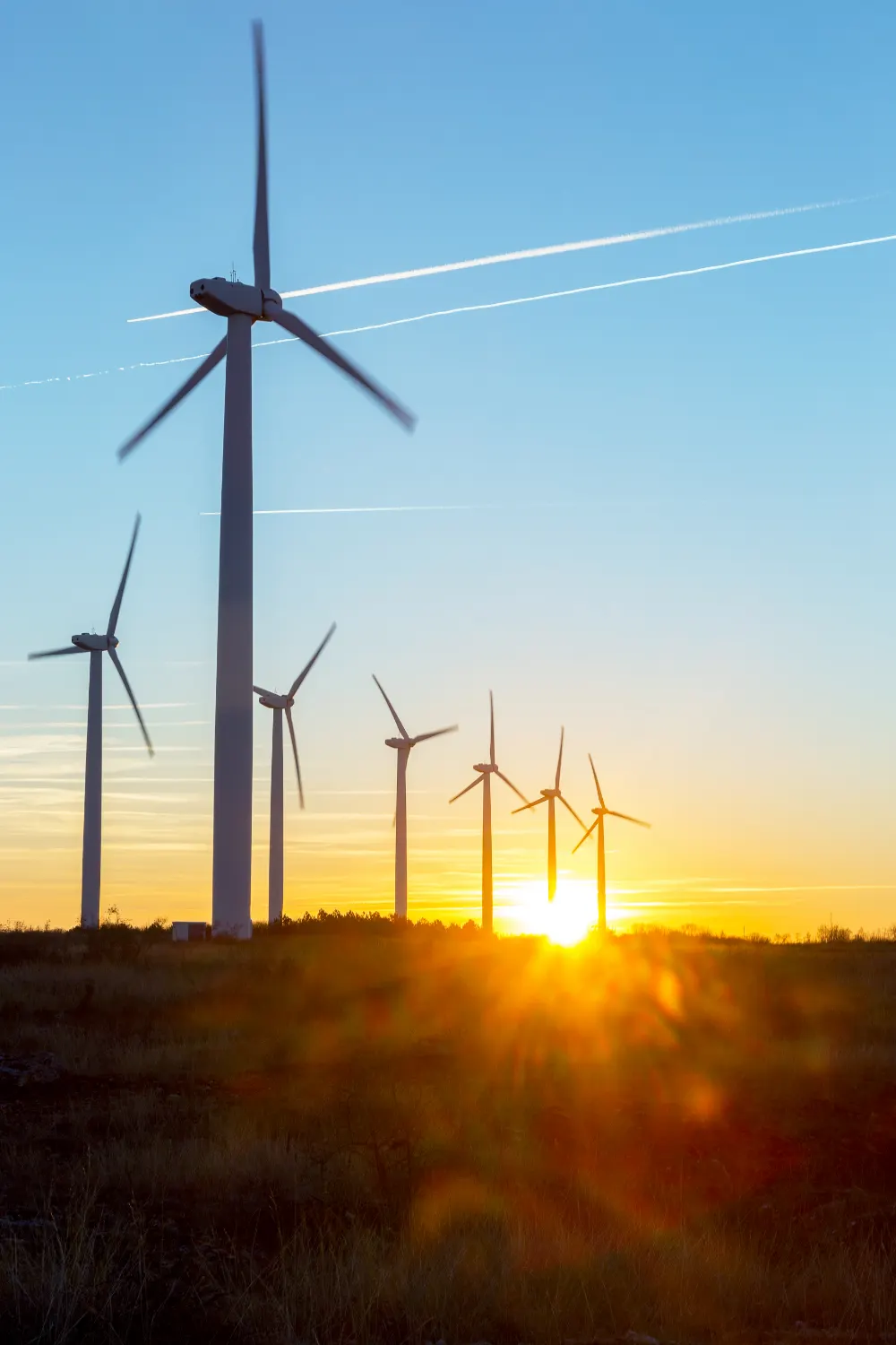 Wind turbines at sunset